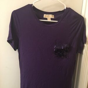 Deep purple tee with purple sequin pocket.